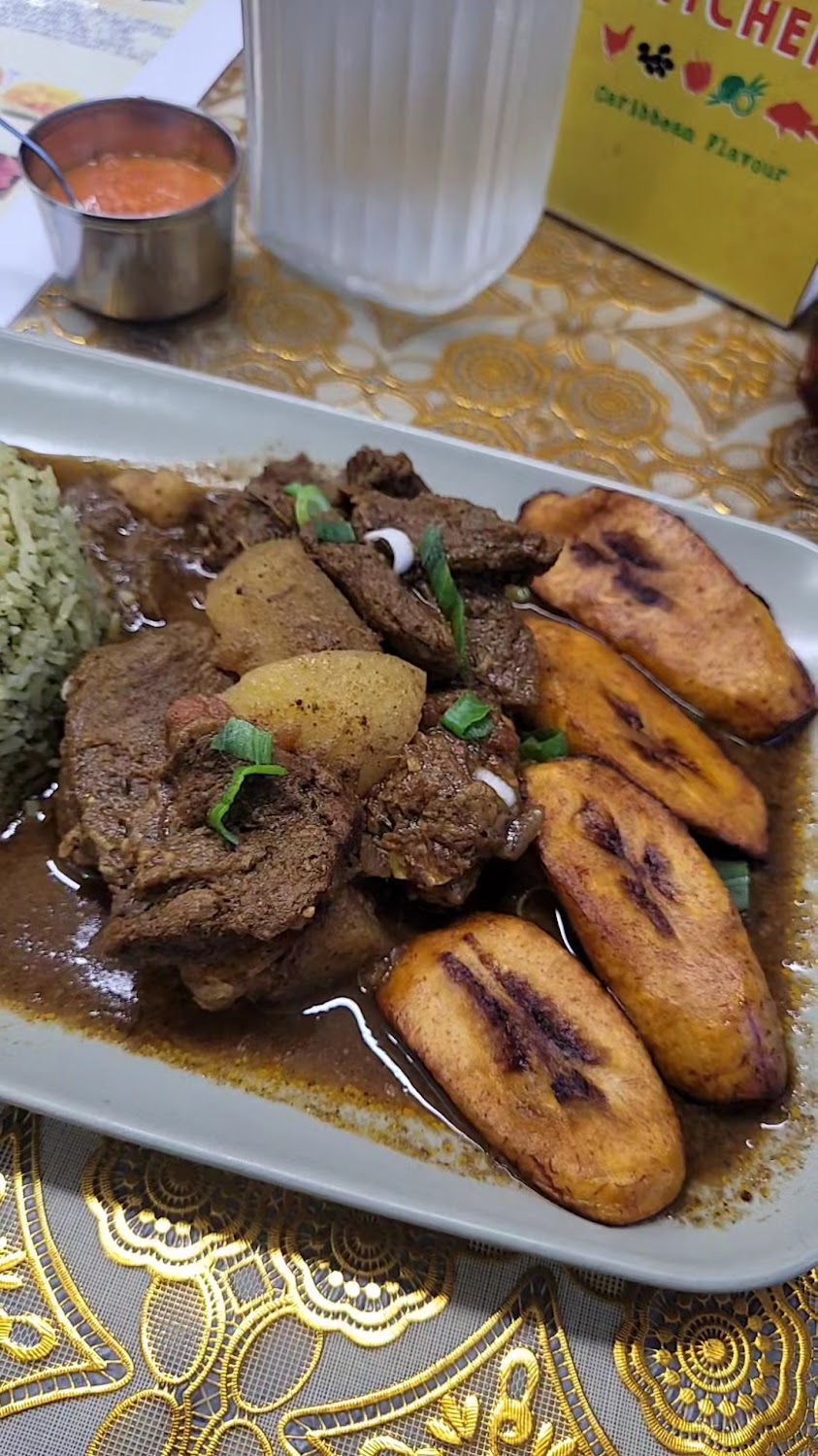 Guyanese curry with potato, seasoned rice and grilled plantain