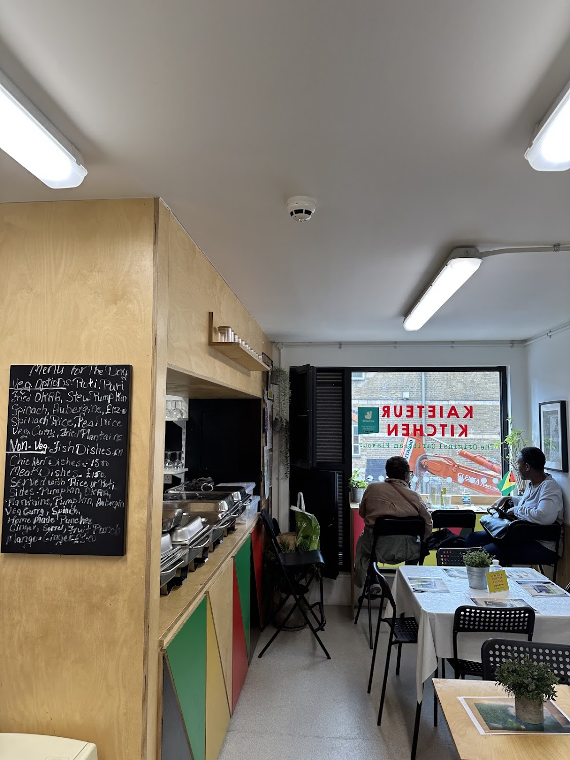 Seating by the window at Kaieteur Kitchen